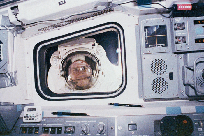 Space History Photo: Rick Hieb Peers Into The Flight Deck
